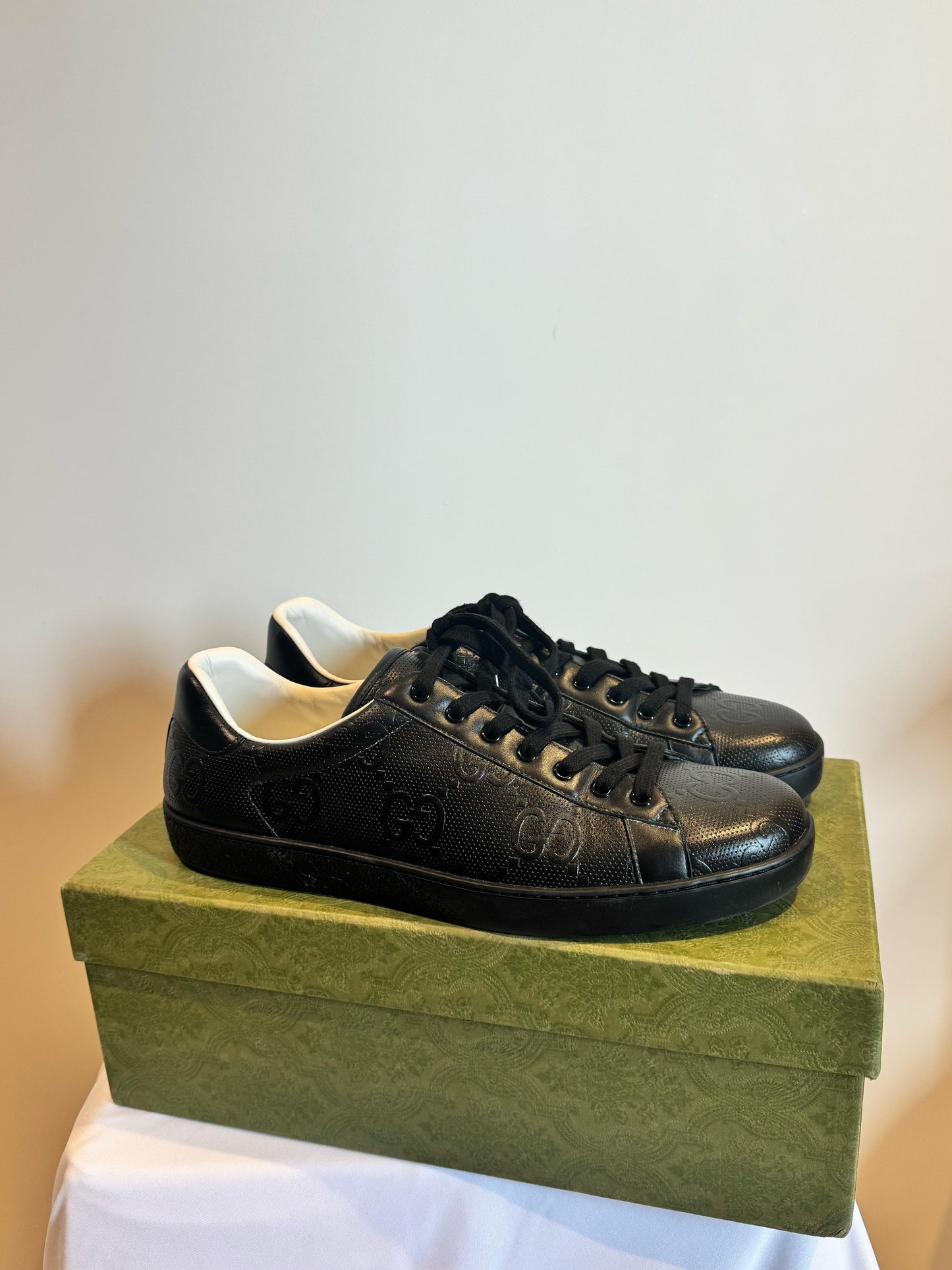 GUCCI MEN’S ACE GG EMBOSSED SNEAKER