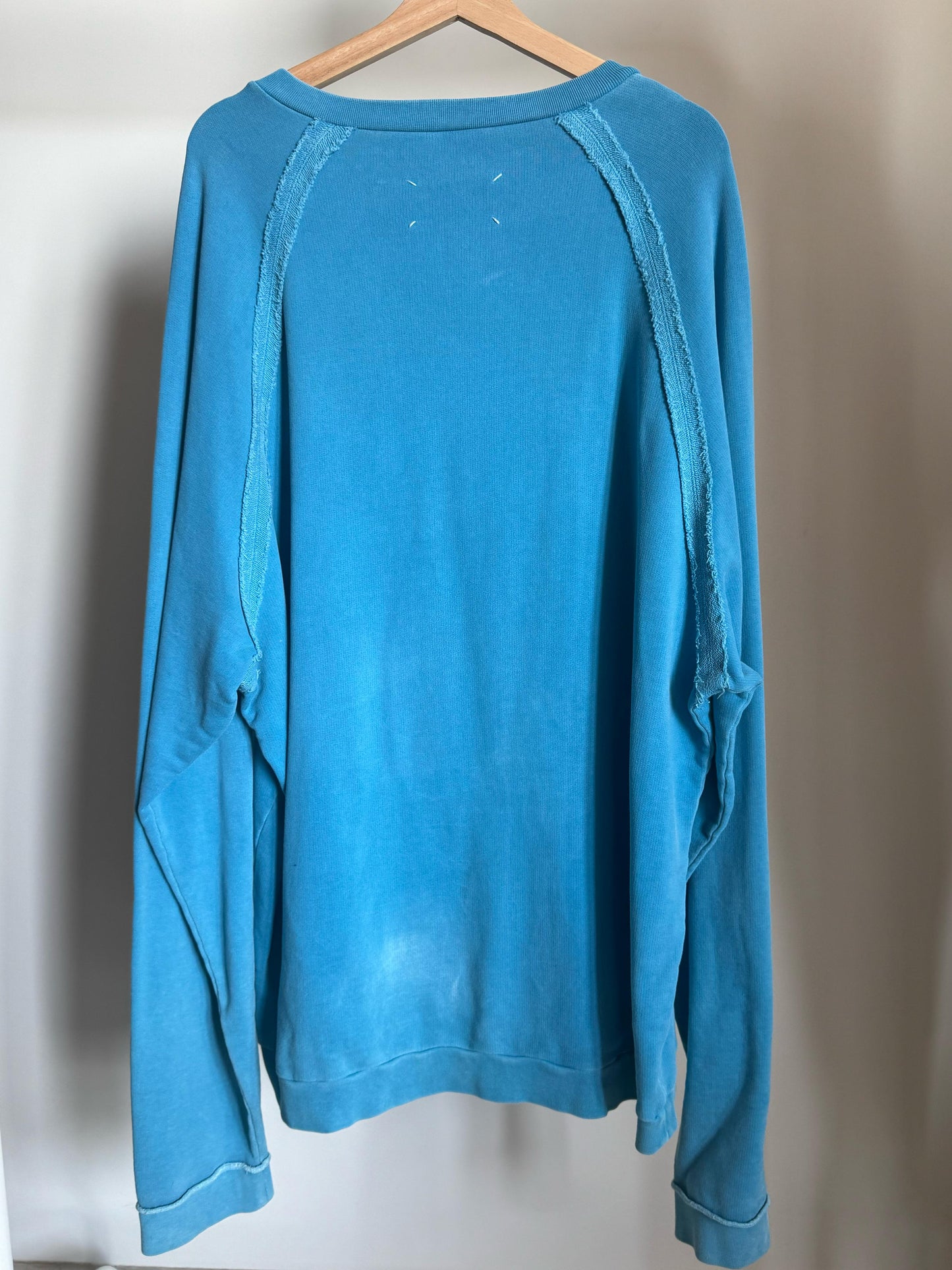 MAISON MARGIELA OVERSIZED MONA LISA RAGLAN EXPOSED SEAM SWEATSHIRT